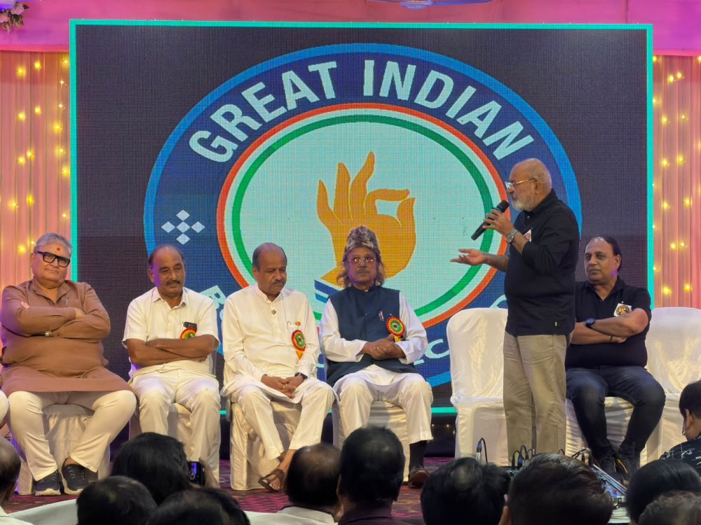 Dignitaries and artists on stage at the Great Indian Book of Records music event